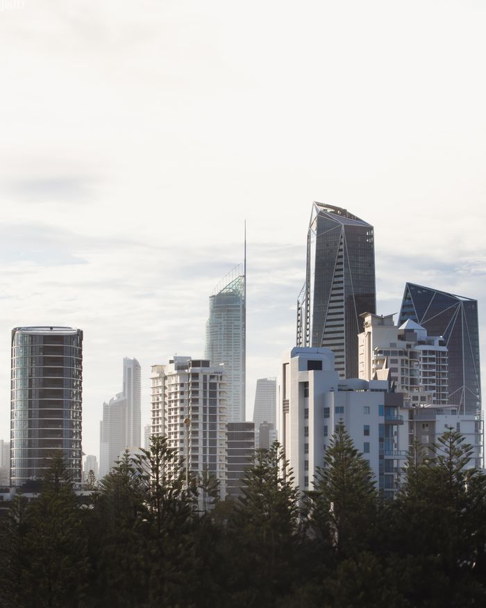 Stunning view of the modern skyscrapers in Broadbeach, Queensland, Australia under a cloudy sky.