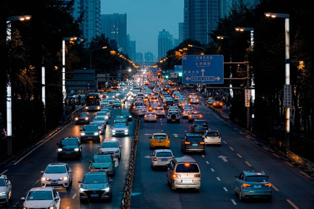 Evening traffic in downtown Chengdu showcasing vibrant urban life in Sichuan, China.